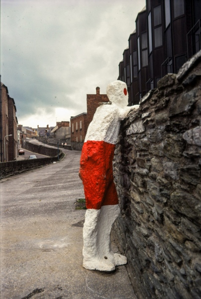 In Their Place (1986) City walls, Derry. Nine life size figures. Re-inforced concrete, paint, reflectors, metal rings. Magazine gate figure/Hangmans bastion reading figures