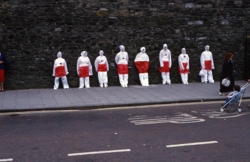 In Their Place (1986) &amp;nbsp;City walls, Derry. Nine life size figures. Re-inforced concrete, paint, reflectors, metal rings. Guildhall Square bustop figure (street theatre performance)