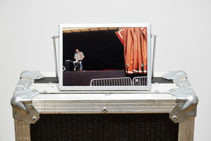 Opening Act (2016) 980 x 180 x 460mm.&amp;nbsp; C-type print, artists&amp;rsquo; keyboard flight case, readymade frame&amp;nbsp; '...Dissolving boundaries between convention and experimentation extends to titles and captions that with rhetorical flourish draw further meaning. Opening Act (2016), a photograph in a readymade frame resting on top of a keyboard flight case suggests the beginning and end of performance narrative continually on the move;...' (text extract from&amp;nbsp;Especiallyeverything: the practices of Locky Morris,&amp;nbsp;Anne Tallentire, Once a day every day all day long, Locky Morris 2019)
